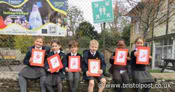 Bristol students honour Armistice Day with poppies, wreaths, and uniforms