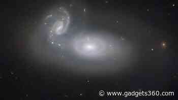Hubble Telescope Captures Image of Merging Galaxies in Coma Cluster, 390 Million Light-Years Away