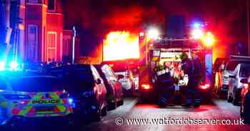 Man arrested after three cars caught fire in Watford road