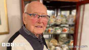The proud collector of 270 ceramic coffee cups