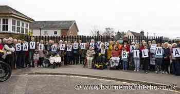 Hundreds turn out to protest proposed change to level crossing