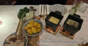 Trying the Cork and Lobster's renowned cheese fondue and small plates