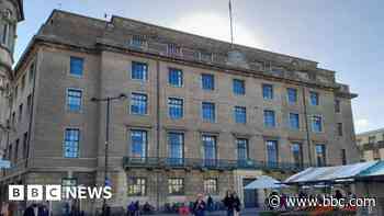 Hotel and solar panels plan for historic buildings