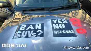 Twenty SUVs graffitied in environmental protest