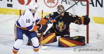 Wolf solid in net as Flames hang on for 2-1 shootout win over Islanders
