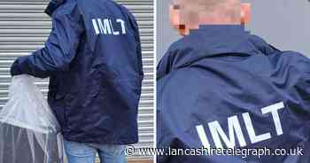 Cash and devices seized after suspected loan sharks arrested in Blackburn