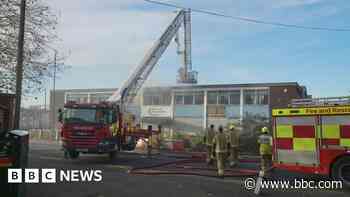 Firefighters tackle derelict warehouse blaze
