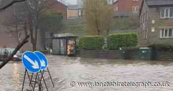 Rivers burst, streets flooded and football called off as storm batters East Lancs