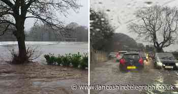 Two rescued from car stranded in flood water as fire crews inundated with calls