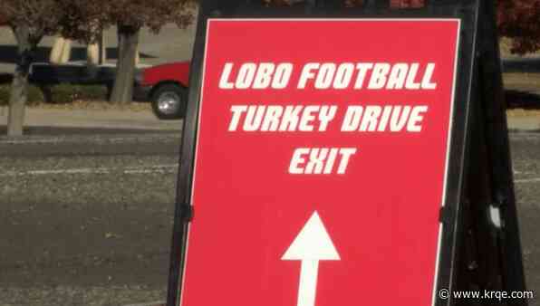 Lobos linemen purchase turkeys for families in need with NIL funds