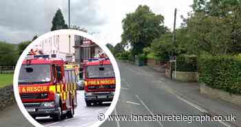 Fire service spends two hours tackling garage blaze in this town