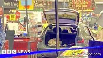 Car crashes through front of Iceland store