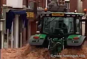 Man arrested after tractor drove through flooded high street