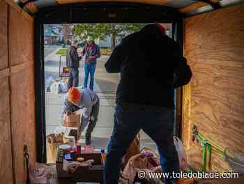 Photo gallery: Parishioners drop off donations at Helping Hands of St. Louis
