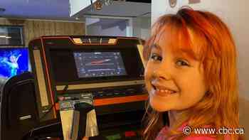 8-year-old taking on Ironkids race to raise money for research into dad's cancer