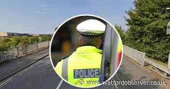 Two-car crash on bridge injures man in his 50s