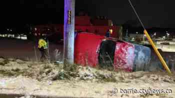 Driver uninjured after vehicle rolls over on slippery road