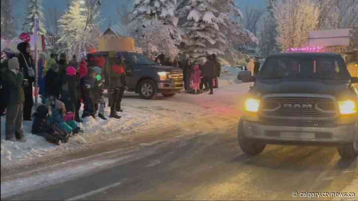 Auburn Bay residents brave the cold to hold a Parade of Lights