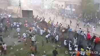 56 people killed in stampede following clashes at a Guinea soccer match, authorities say