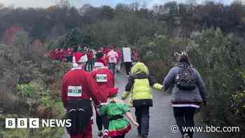 Hundreds of Santas take part in charity fun run