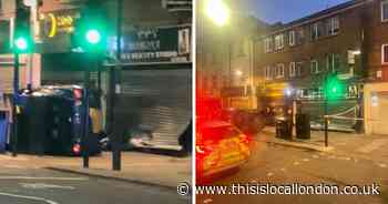 Man arrested as car flips in crash on busy road near Holloway