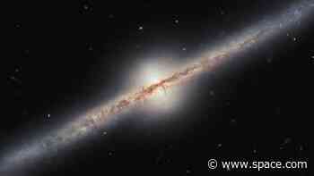 Inside the Hubble Space Telescope's 23-year-long look at a beautiful blue galaxy