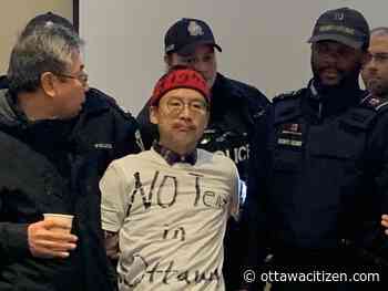 Man charged with trespassing after disrupting tent structure information session