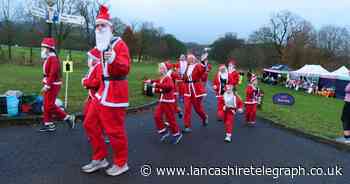Runners dressed as Father Christmas brave the cold for Pendleside Hospice