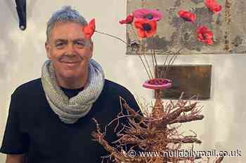 Local artist uses Christmas tree art to highlight effects of war on nature