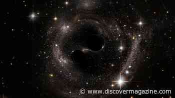 Some Black Holes at the Centers of Galaxies Have a Buddy