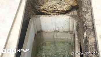 Work under way to tackle flooded graves