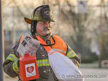 Photo Gallery: Old Newsboys Goodfellows Association charity newspaper sale