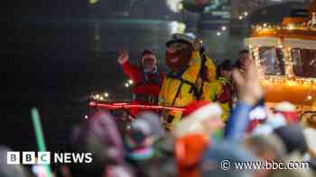 Santa swaps sleigh for lifeboat at lights turn on