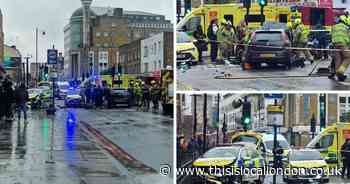 In pictures: crash scene after police collide with car in Hackney