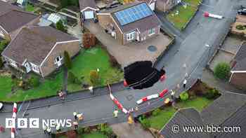 Families 'devastated' as sinkhole in street grows