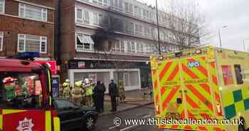 Boy and woman taken to hospital after three-hour flat fire in Eltham