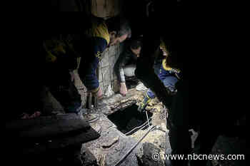 Syrians search notorious Assad jail for underground cells while freed prisoners rejoice