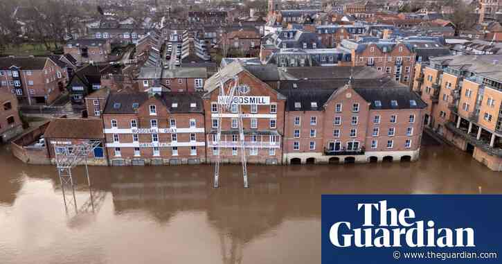 Thousands in UK without power and train services disrupted after Storm Darragh