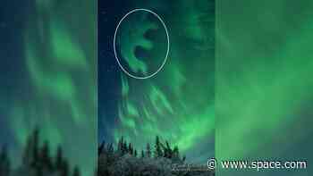 Extremely rare, black 'anti-auroras' paint luminous 'letter E' above Alaska