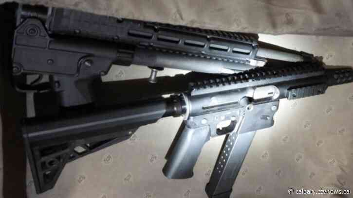 Several guns seized during searches of Calgary homes, vehicles: police
