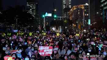 South Korean police raid president's office over martial law declaration