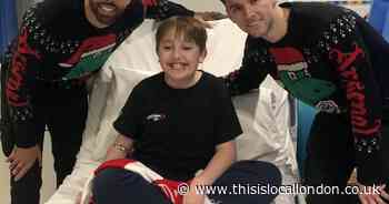 Arsenal stars deliver Christmas presents to children in hospital