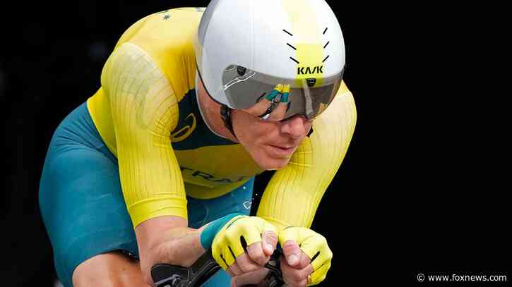 Ex-world champion cyclist faces prison time after pleading guilty to lesser charge in death of Olympian wife