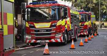 Emergency services called to Poole to find garage "well alight"