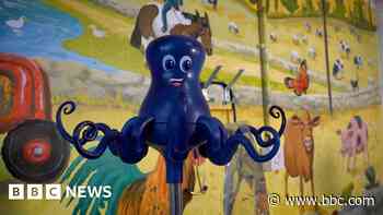 Old hospital gowns made into octopus IV drip hooks