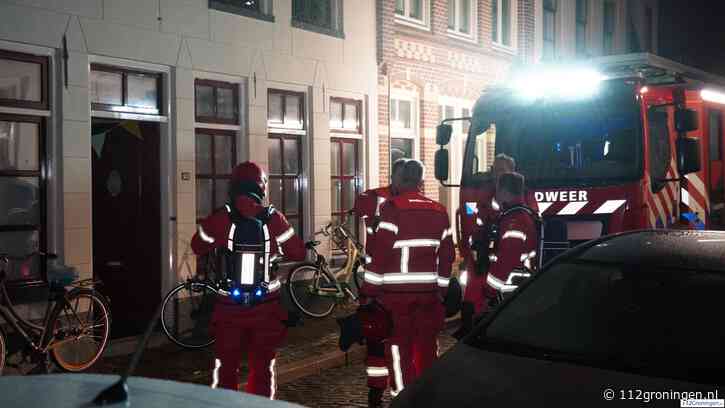 Korte brand in woning aan Turfstraat in Groningen, bewoner nagekeken