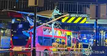Roof of double decker bus left hanging after crash with South Norwood bridge