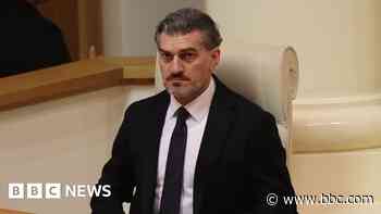 Georgia's turmoil deepens as ex-footballer named president