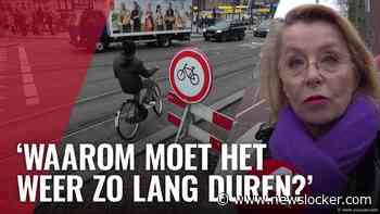 Spookrijdende fietsers op Damrak