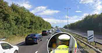 Audi crash near busy roundabout causes long delays